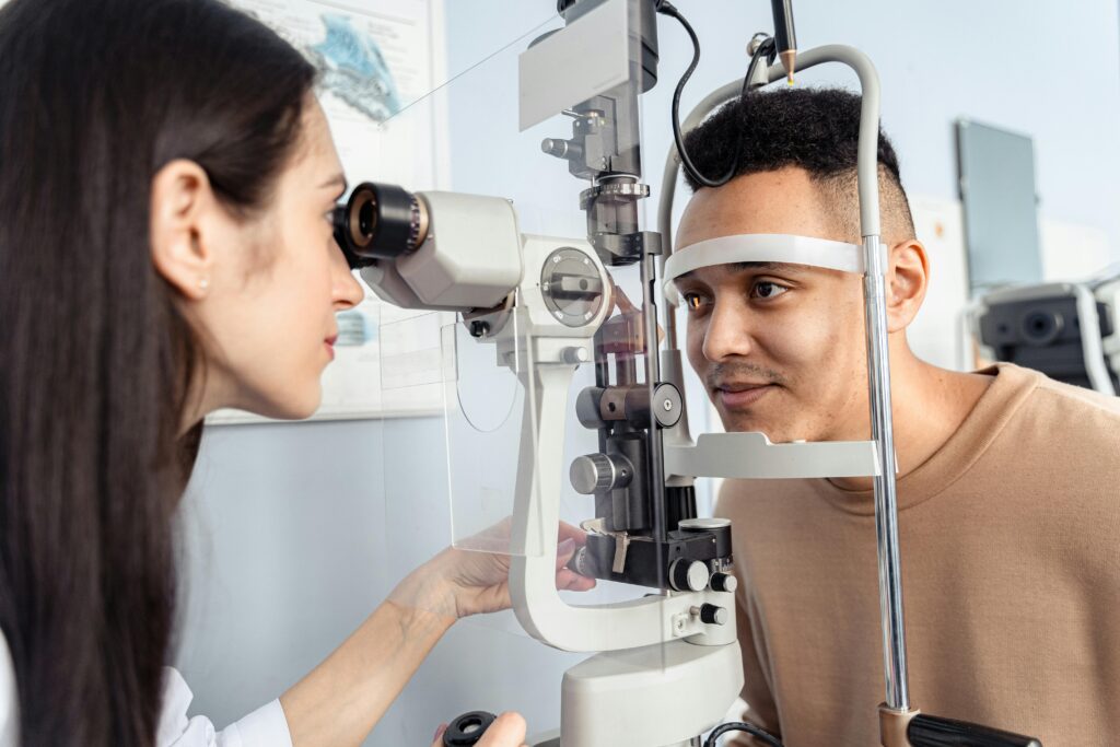 Optometrist examining a patient